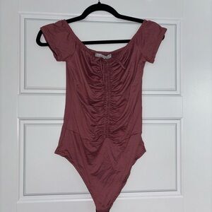Pink off the shoulder bodysuit